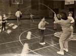 Kids playing jump rope in Lab School gymnasium by Indiana State University, University Archives