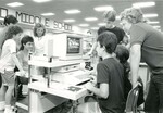 Students and teachers work on computers by Indiana State University, University Archives