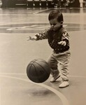 Toddler catching basketball by Indiana State University, University Archives