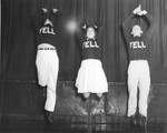 Yell Squad jumping in the air by Indiana State University