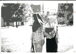 Women walk around campus by Indiana State University, University Archives
